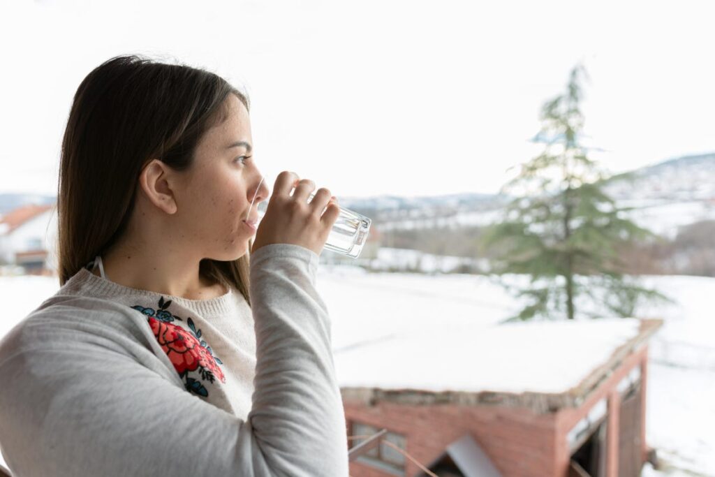 health and wellness products - a woman drinking water 