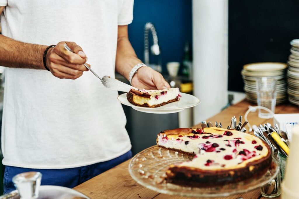 Man taking a slice of cake- Diabetic Sweets